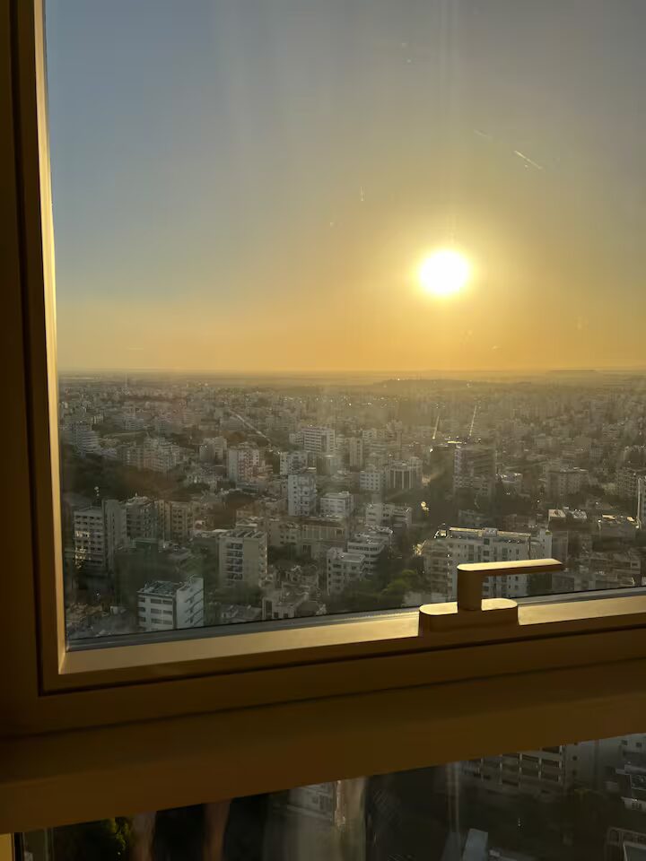 Sunset over Nicosia through the kitchen window